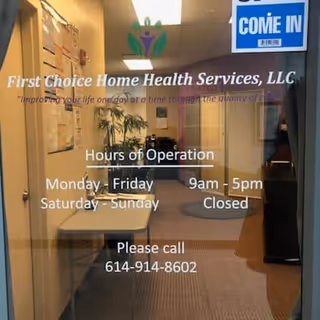 Glass door displays First Choice Home Health Services, LLC name and hours in a hallway.