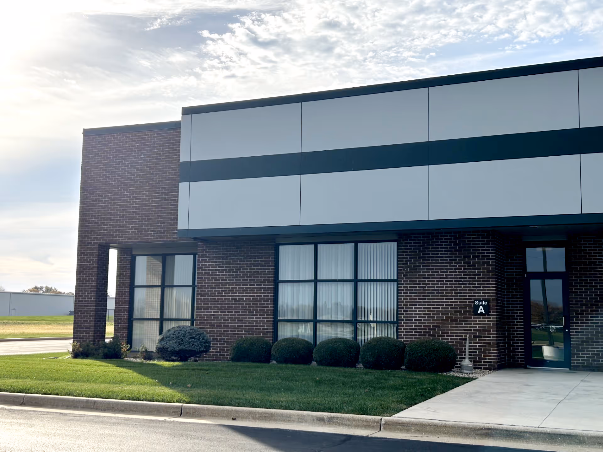 Front view of Forte Residential Kokomo North Branch with brick exterior and large windows.