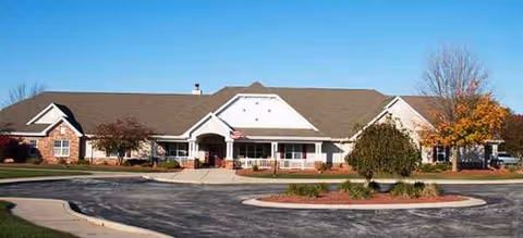 Front exterior of Brookdale Valparaiso senior living facility with parking.