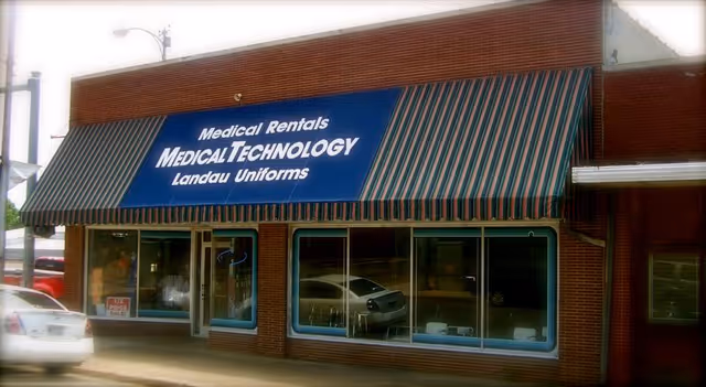Brick storefront with striped awning displaying Medical Technology and Medical Rentals.