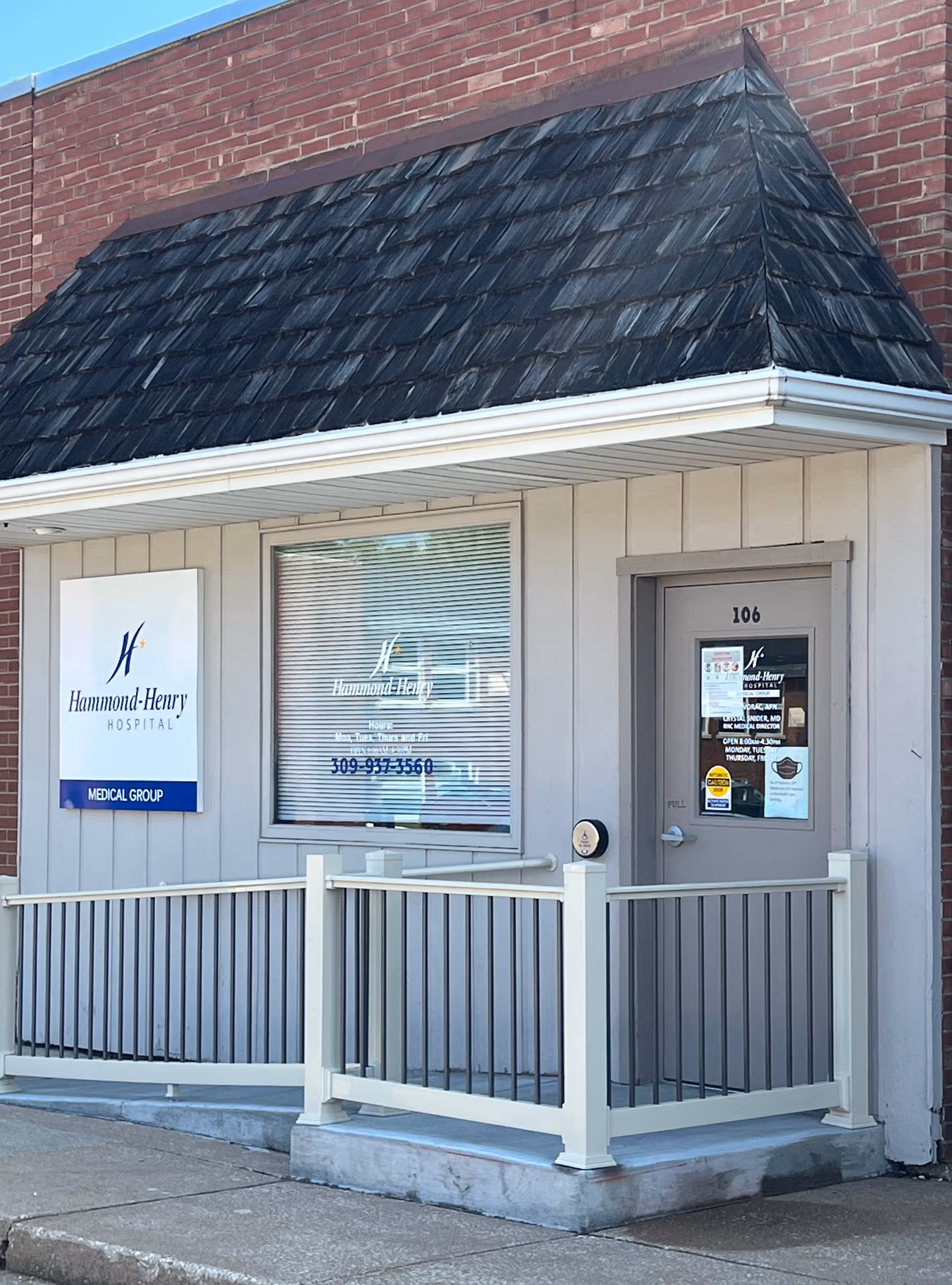 Front entrance of Hammond-Henry Hospital Home Health Services with sign and railing.