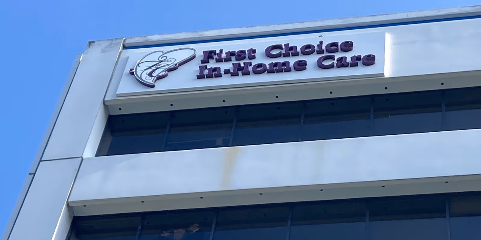 Exterior of a building displaying the First Choice In-Home Care sign.