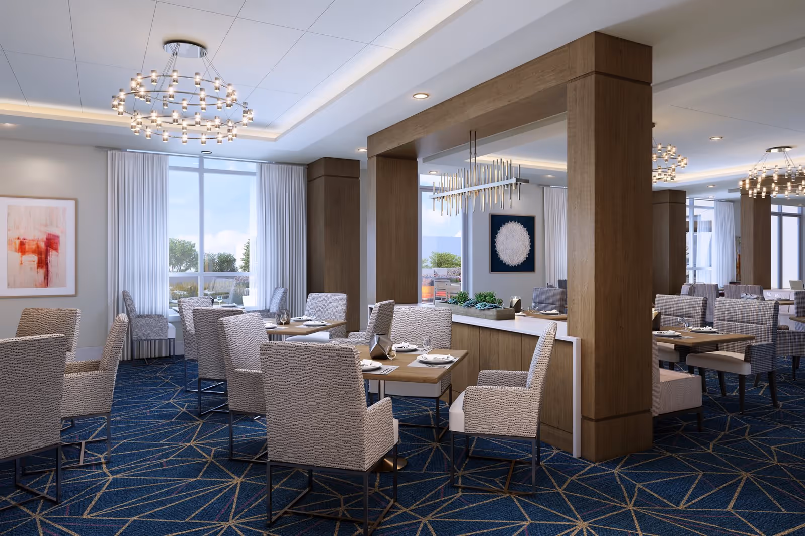 Bright modern dining room with set tables, patterned upholstered chairs, wood columns, and chandeliers.