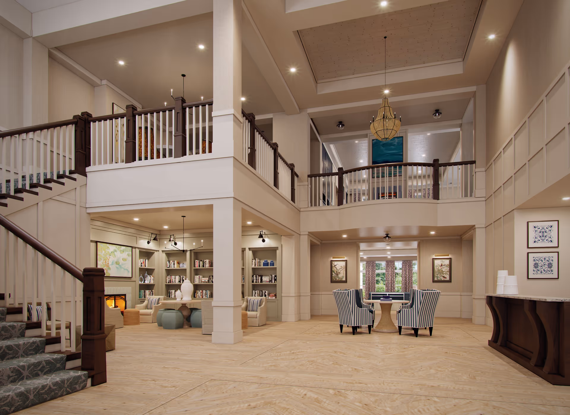 Spacious senior living facility common area with a two-story ceiling, wooden staircase with carpet runner, built-in bookshelves, cozy seating areas with armchairs and ottomans, a fireplace, and a large chandelier hanging from the ceiling. The room has light wood flooring and neutral-colored walls with decorative artwork.
