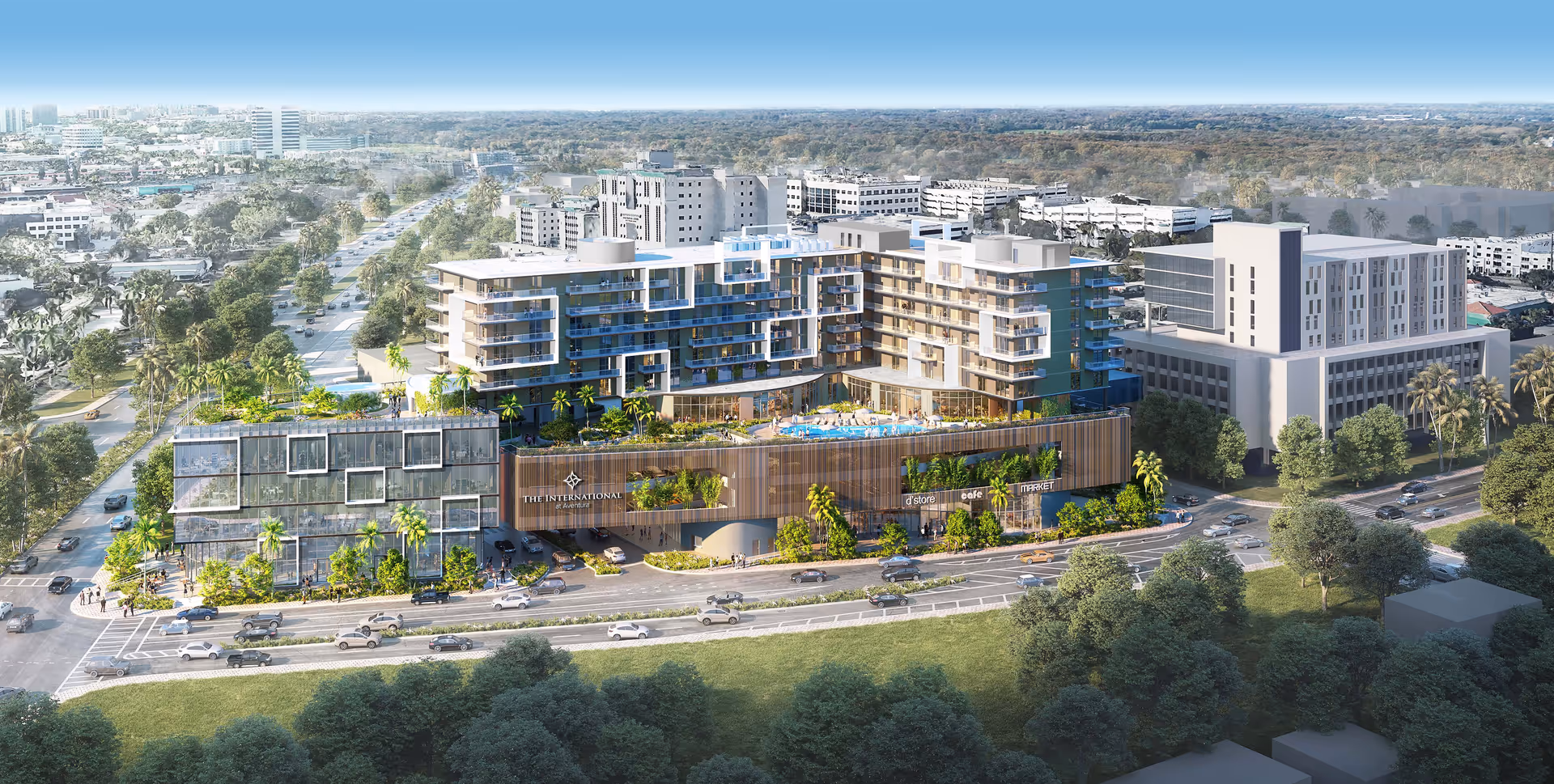 Aerial view of a modern multi-story senior living complex with terraces, a rooftop pool, and street-front landscaping.