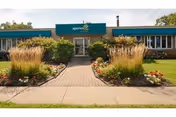 Front view of Aperion Care Burbank facility with entrance and landscaping.