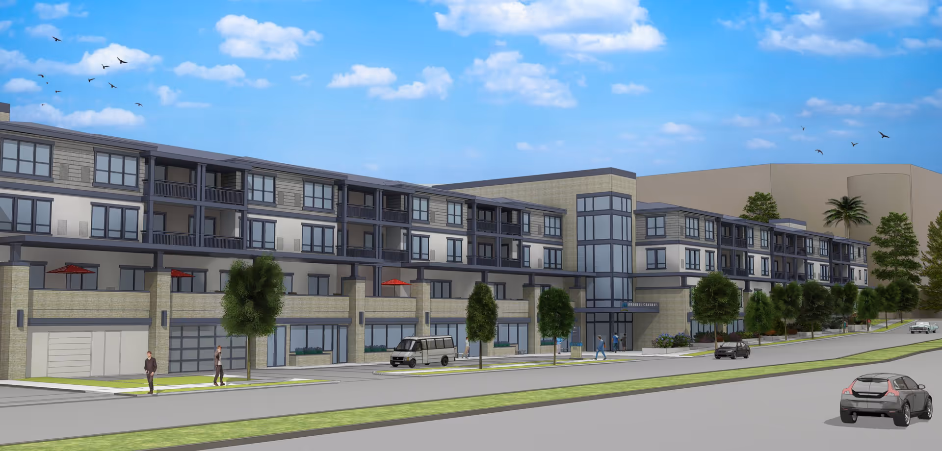 Exterior view of a modern multi-story senior living facility named Merrill Gardens At Rolling Hills Estates, featuring large windows, balconies, trees along the sidewalk, several cars parked on the street, and a few people walking nearby under a blue sky with scattered clouds and birds flying.
