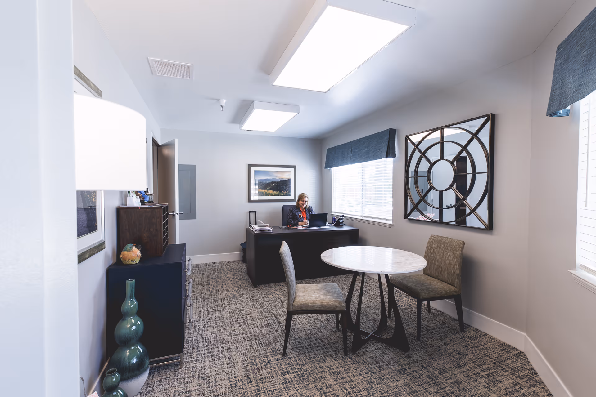 Reception area inside Morningstar Assisted Living with a staff member at a desk.