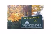 Welcome to Glenwood Park Independent Living sign with autumn trees in background