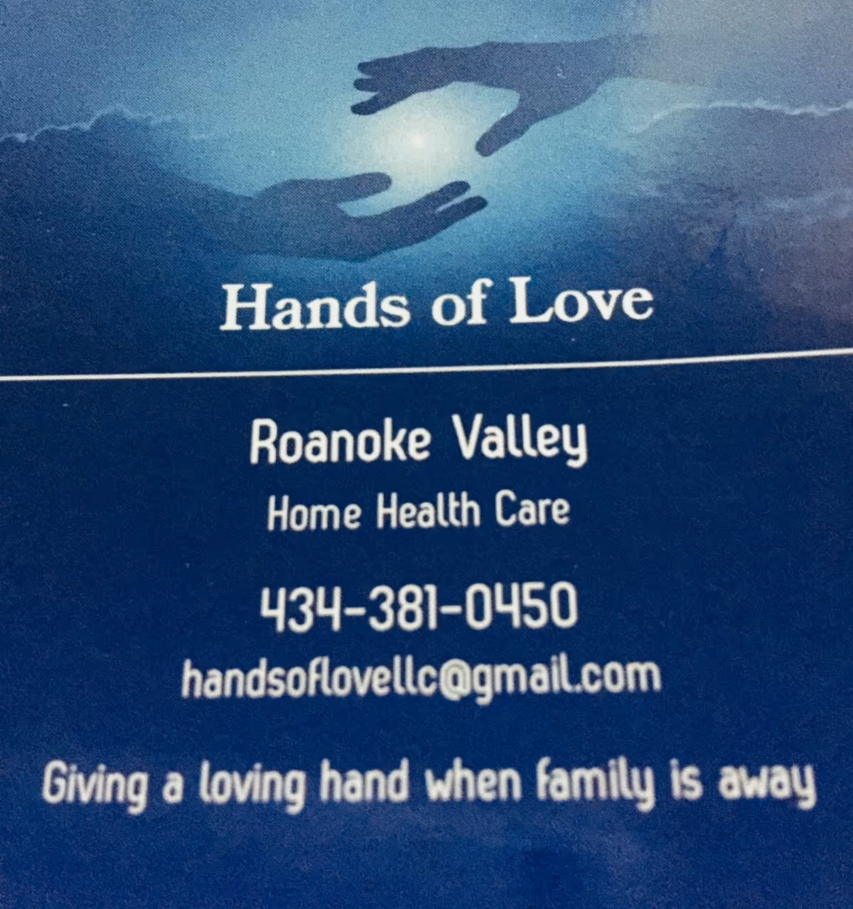 Blue sign displays Hands of Love LLC and contact information for home health care.