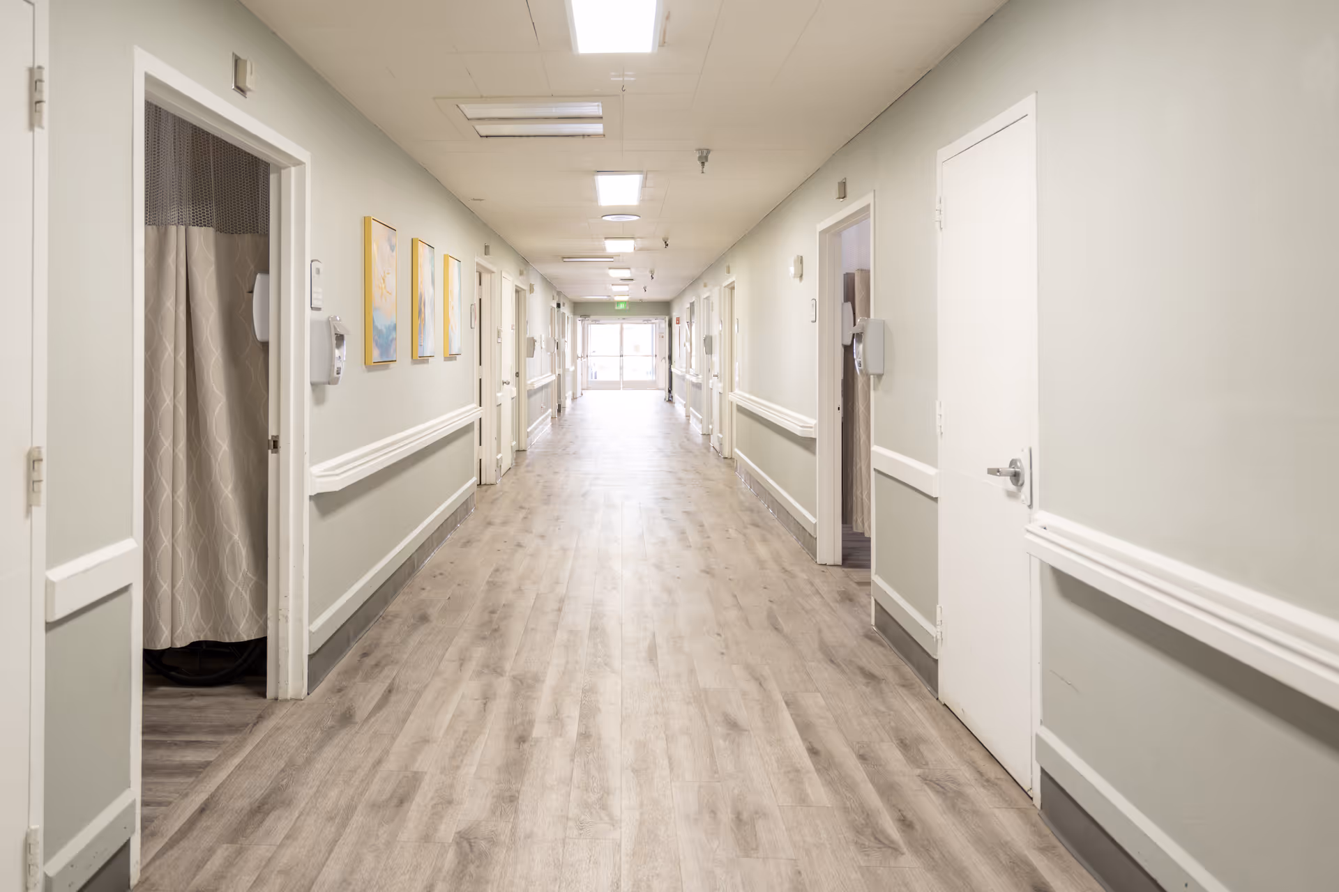 Interior corridor in Buena Vista Care Center with doors along both sides.