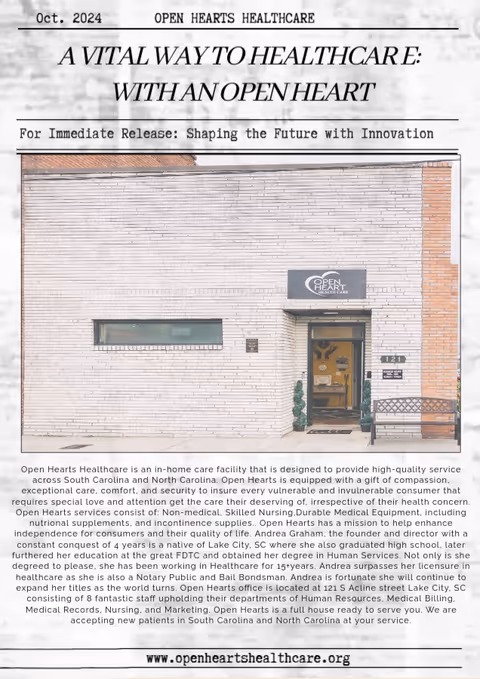 A brick building facade with Open Hearts Healthcare sign and entrance door.
