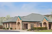 Exterior view of Carbondale Nursing and Rehabilitation Center with green trim.