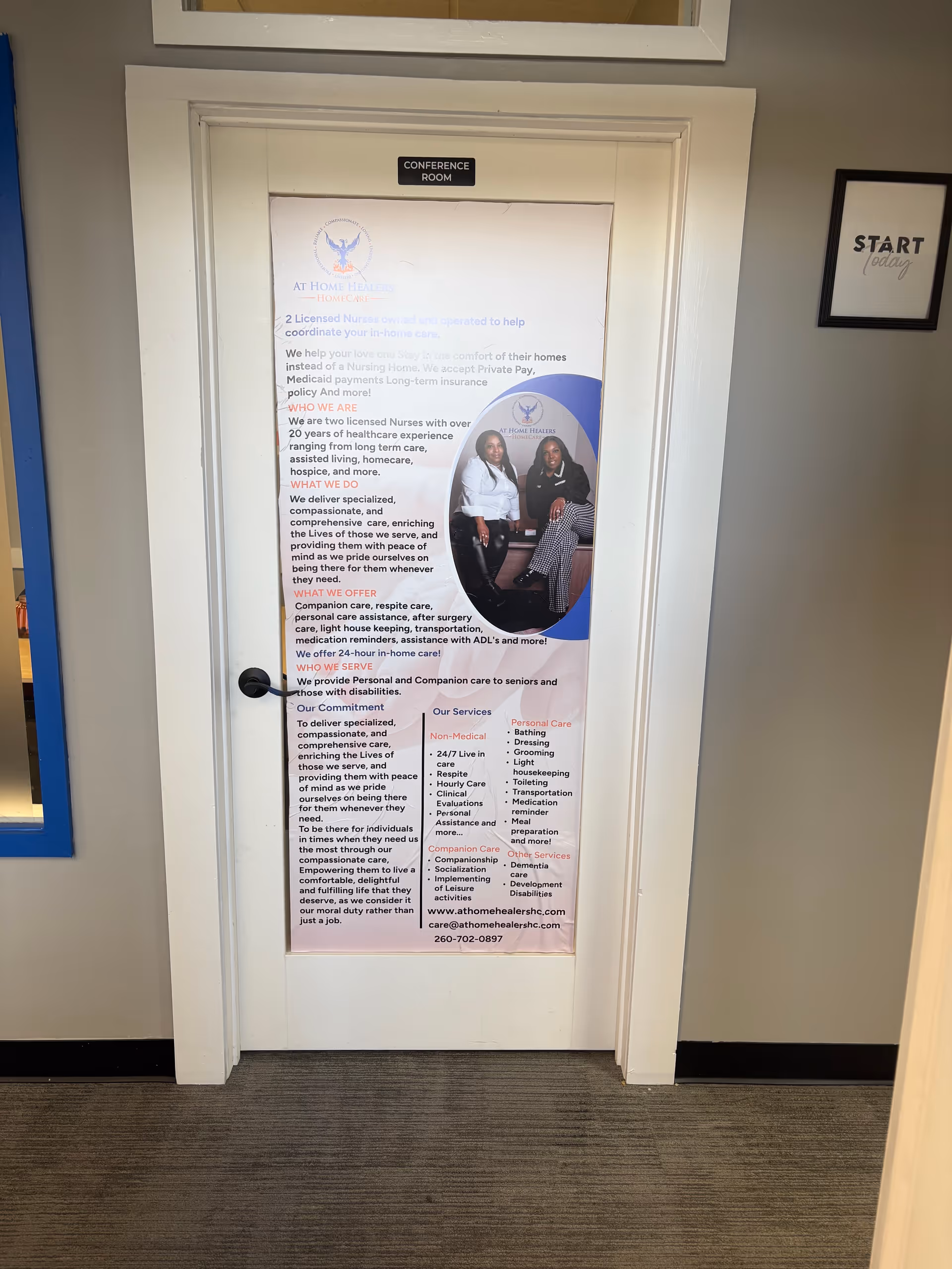Door labeled Conference Room with large poster about At Home Healers Home Care in a hallway.