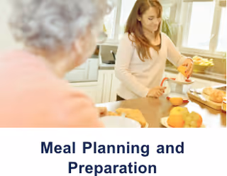 Two people in a kitchen preparing meals together.