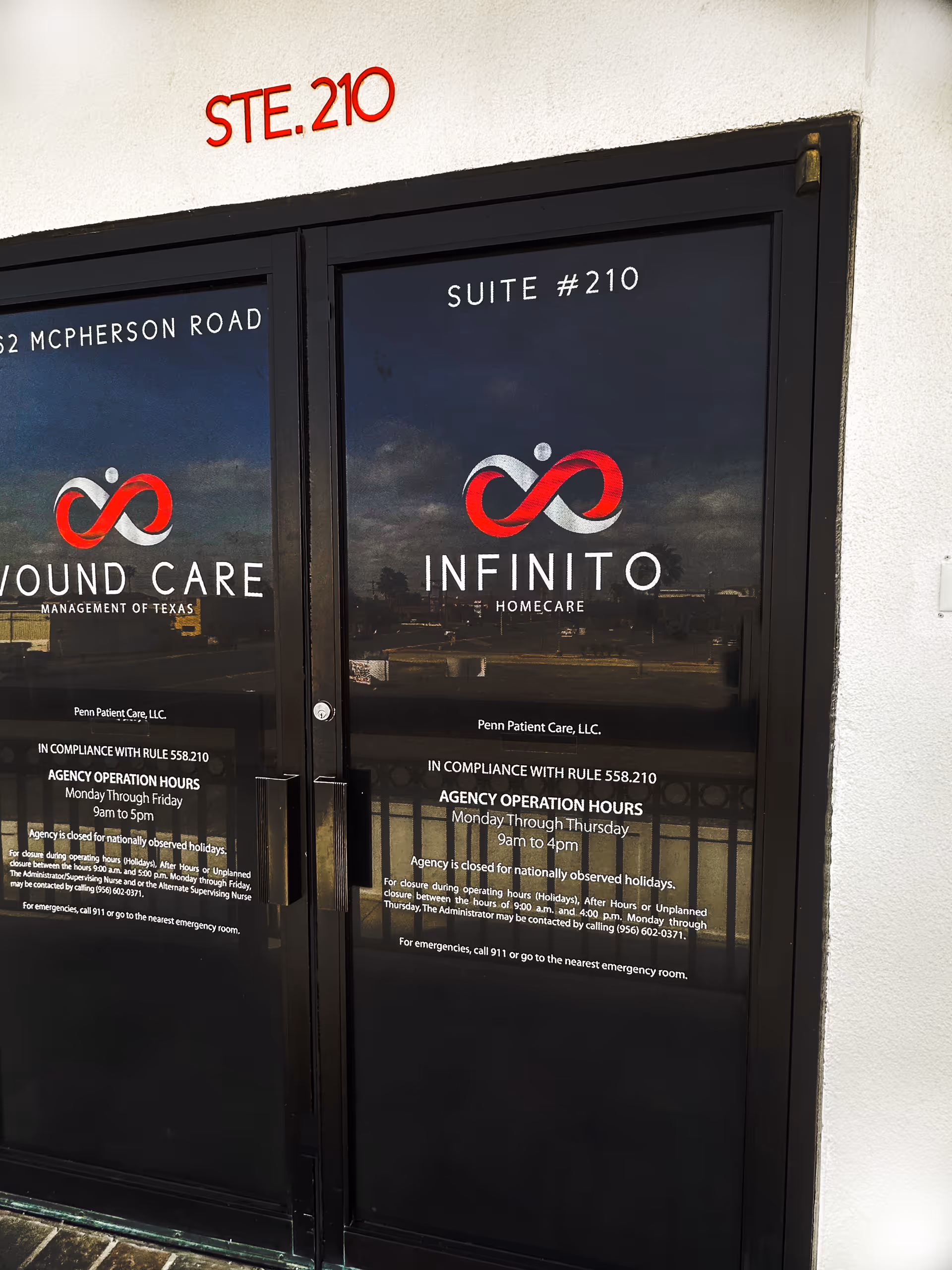 Front entrance glass doors show Infinito Homecare signage and suite numbers.