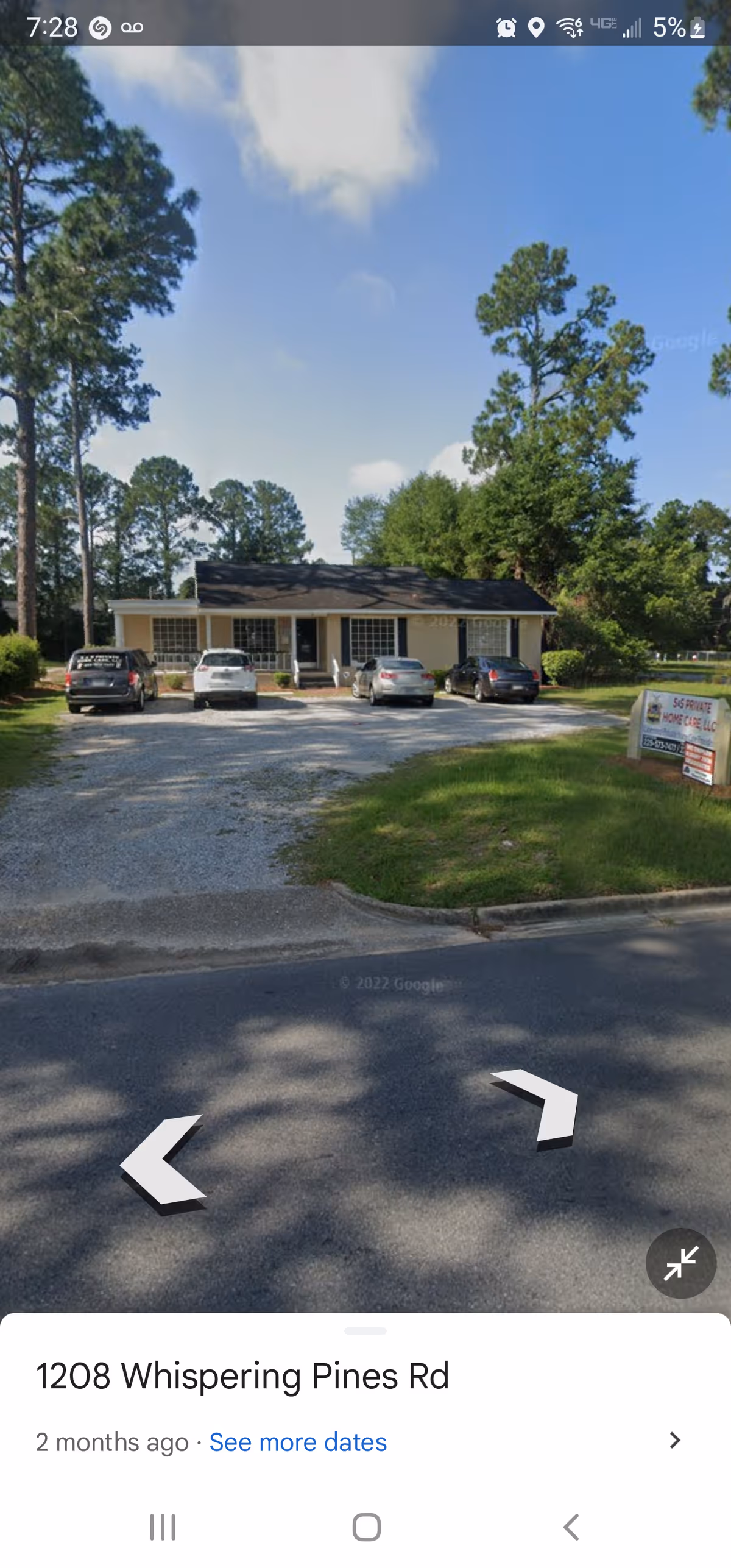 Front view of S & S Private Home Care building with cars parked in front.