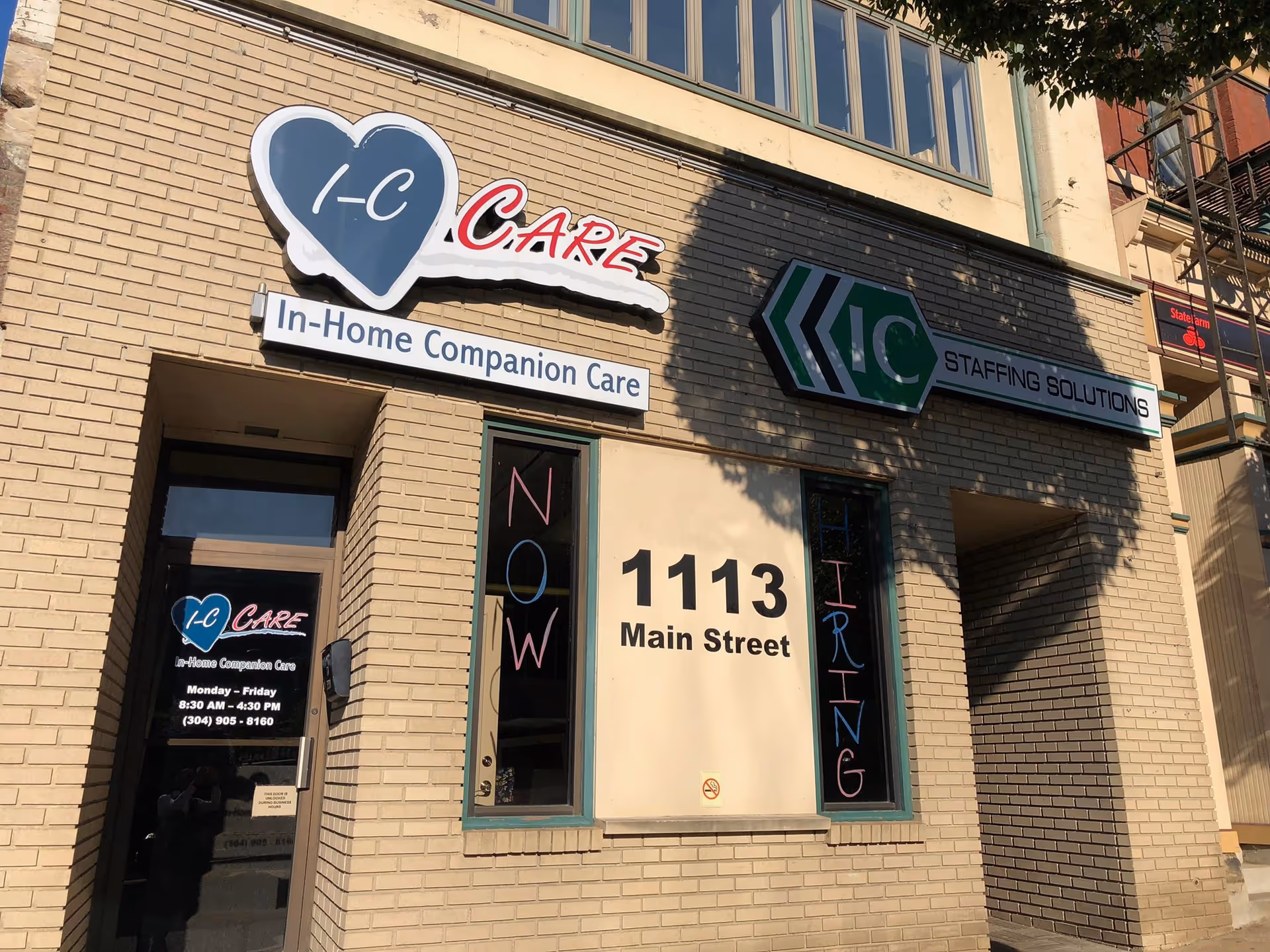 Brick storefront shows IC Care signage, In-Home Companion Care, and 1113 Main Street.