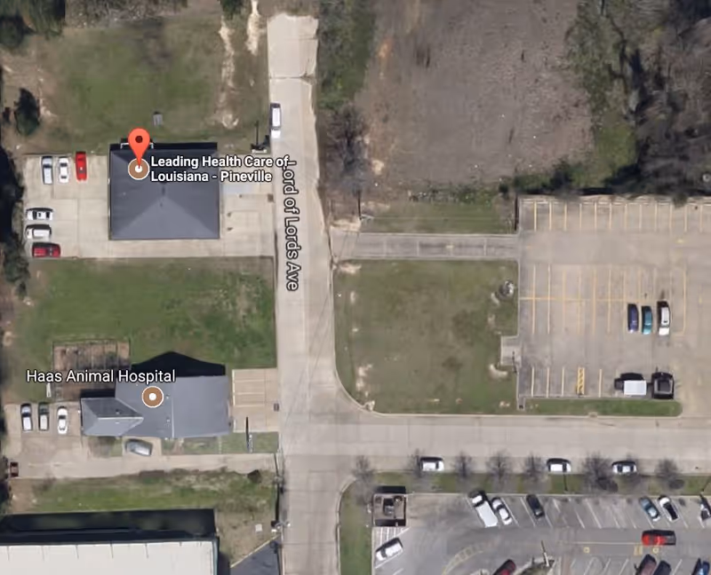 Aerial exterior view of Leading Health Care of Louisiana Pineville with surrounding parking.