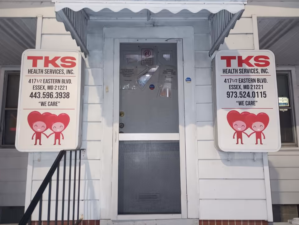 Front exterior of a TKS Health Services building with two signs.