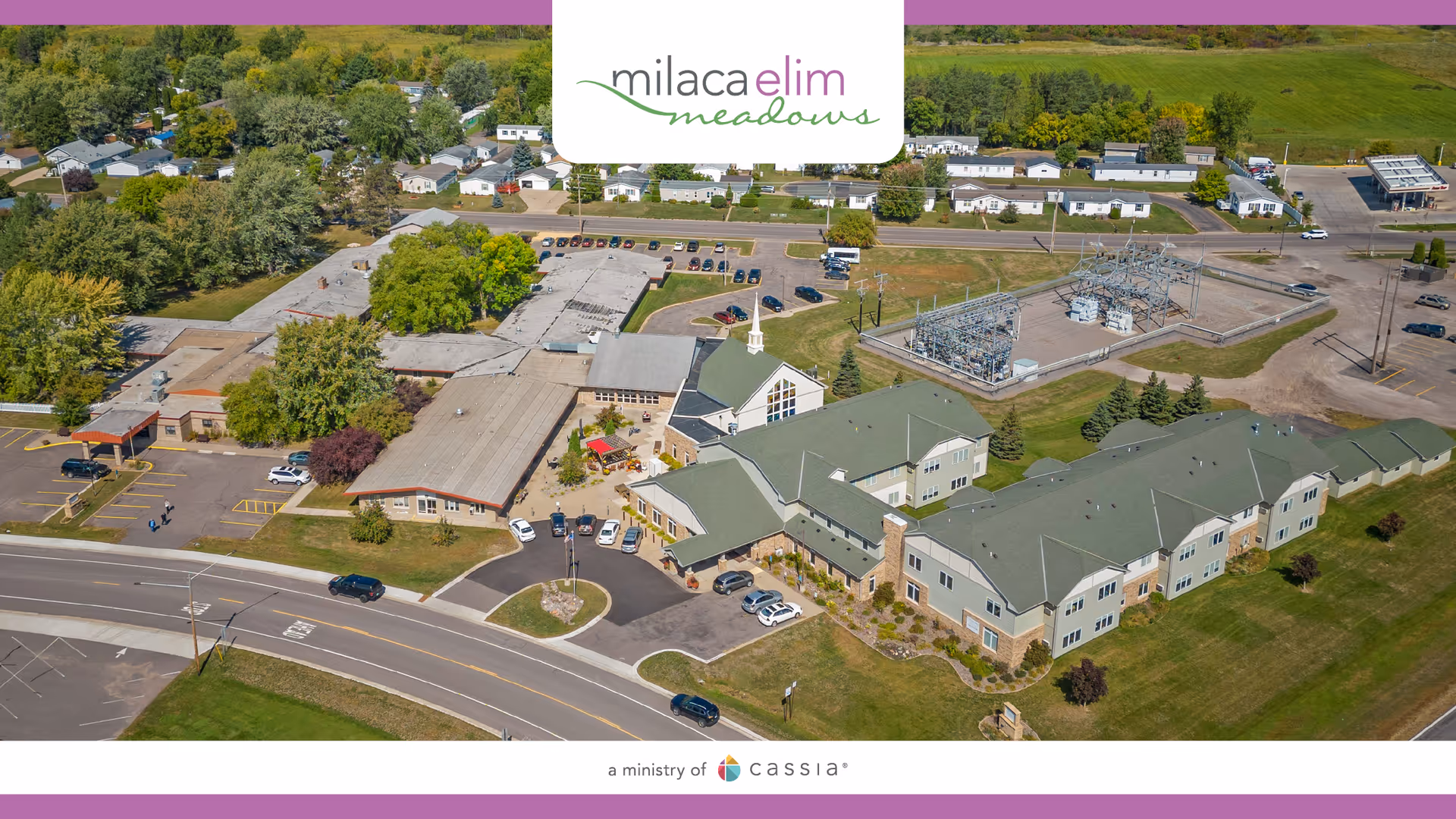 Aerial view of Elim Home Milaca senior living campus with multiple buildings and parking.