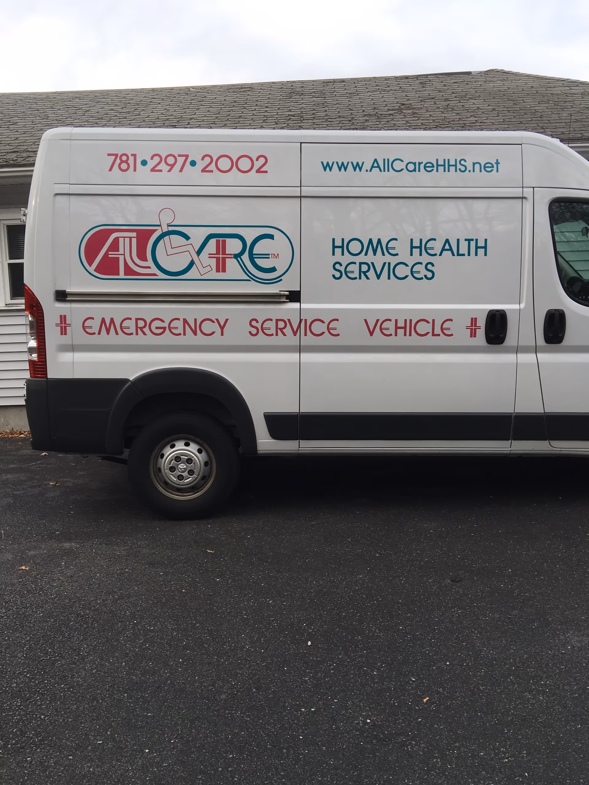White van labeled AllCare Home Health Services parked outside a building.
