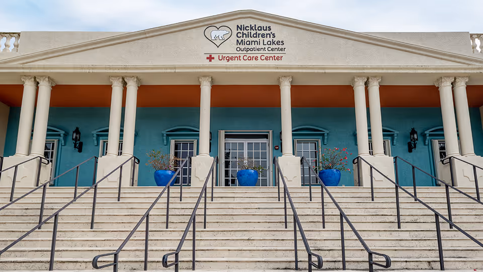 Facade of Nicklaus Children's Miami Lakes Outpatient Center with columns and stairs.