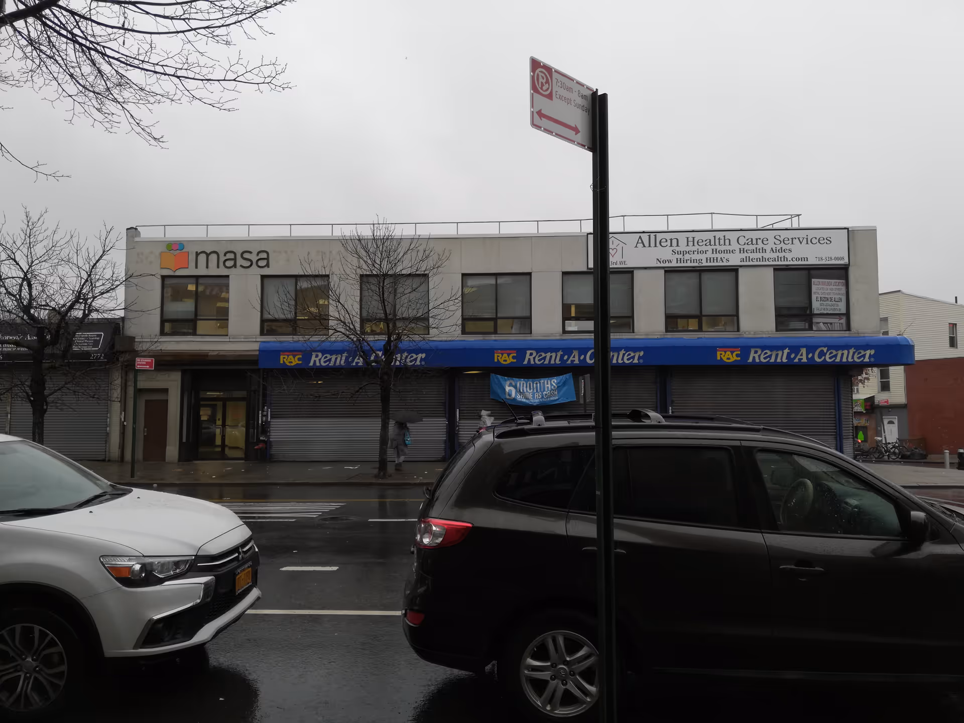 Street view of a building with Allen Health Care Services sign beside a Rent-A-Center storefront.