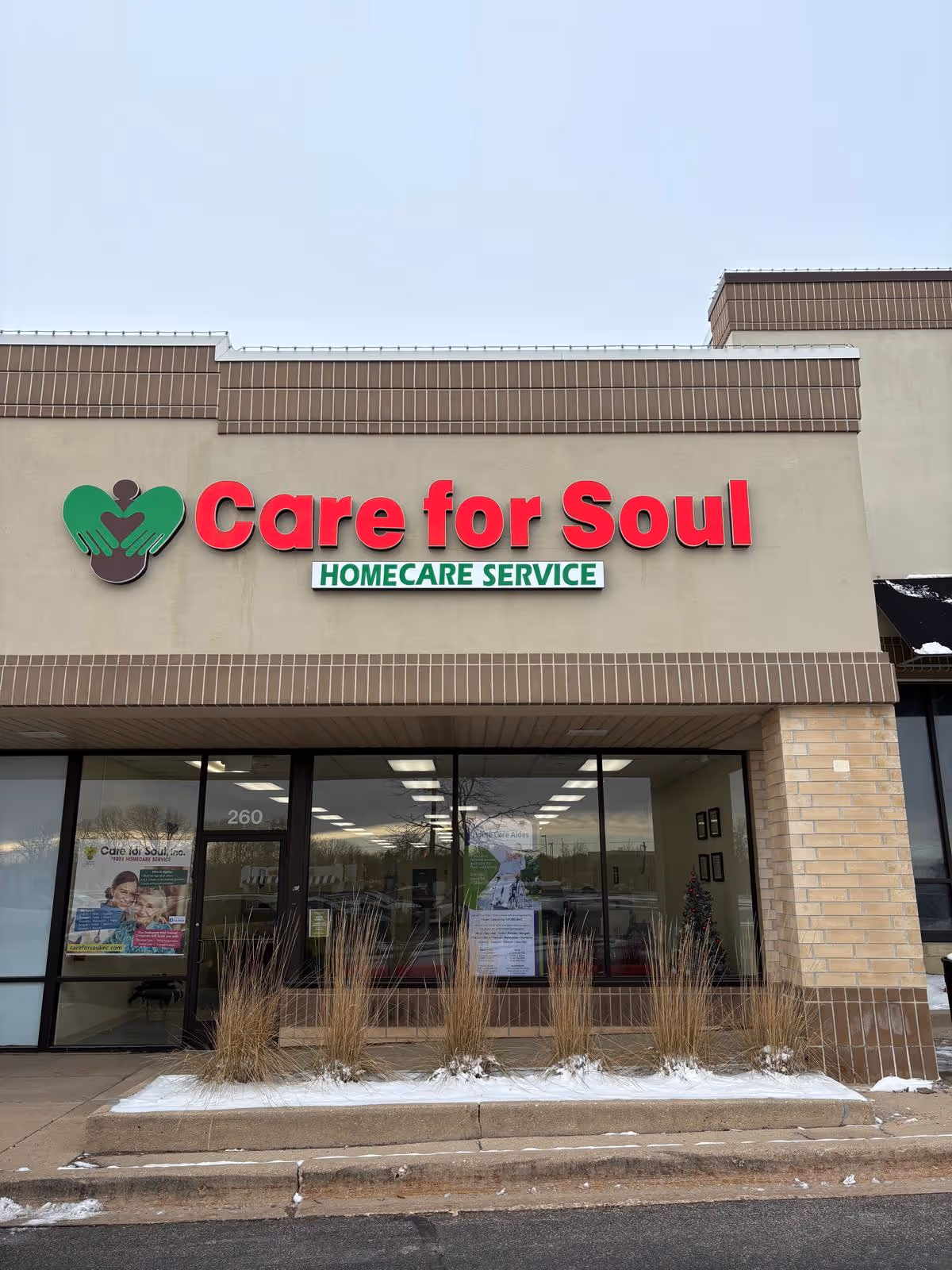 Front view of Care for Soul Homecare Service storefront with large windows.