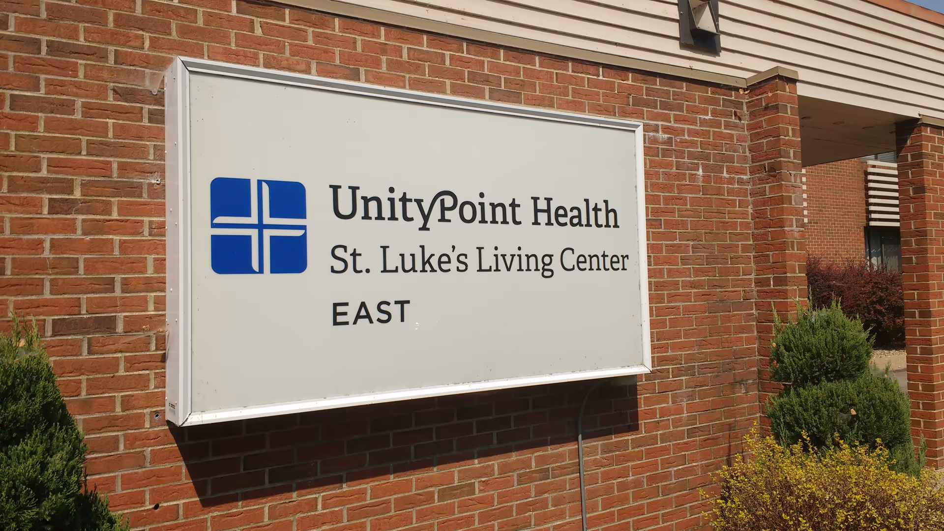 Exterior brick building with UnityPoint Health St. Luke's Living Center East sign.