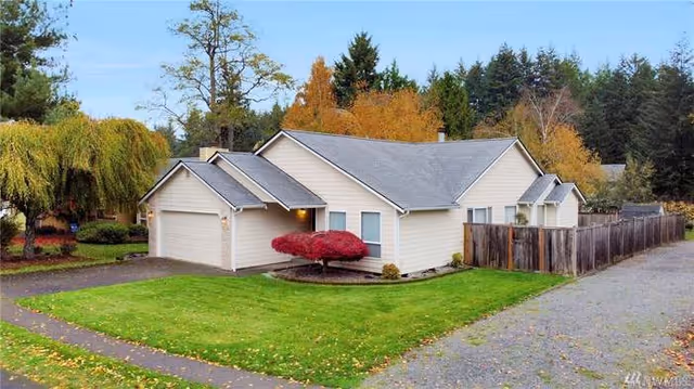 Front view of LIFECARE ADULT FAMILY HOME, a single-story residence with driveway and lawn.