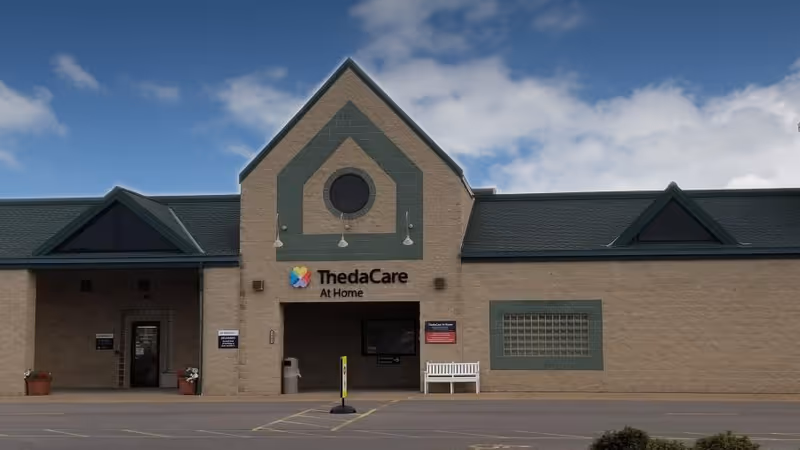 ThedaCare At Home-Appleton building exterior with brick facade and peaked roof.