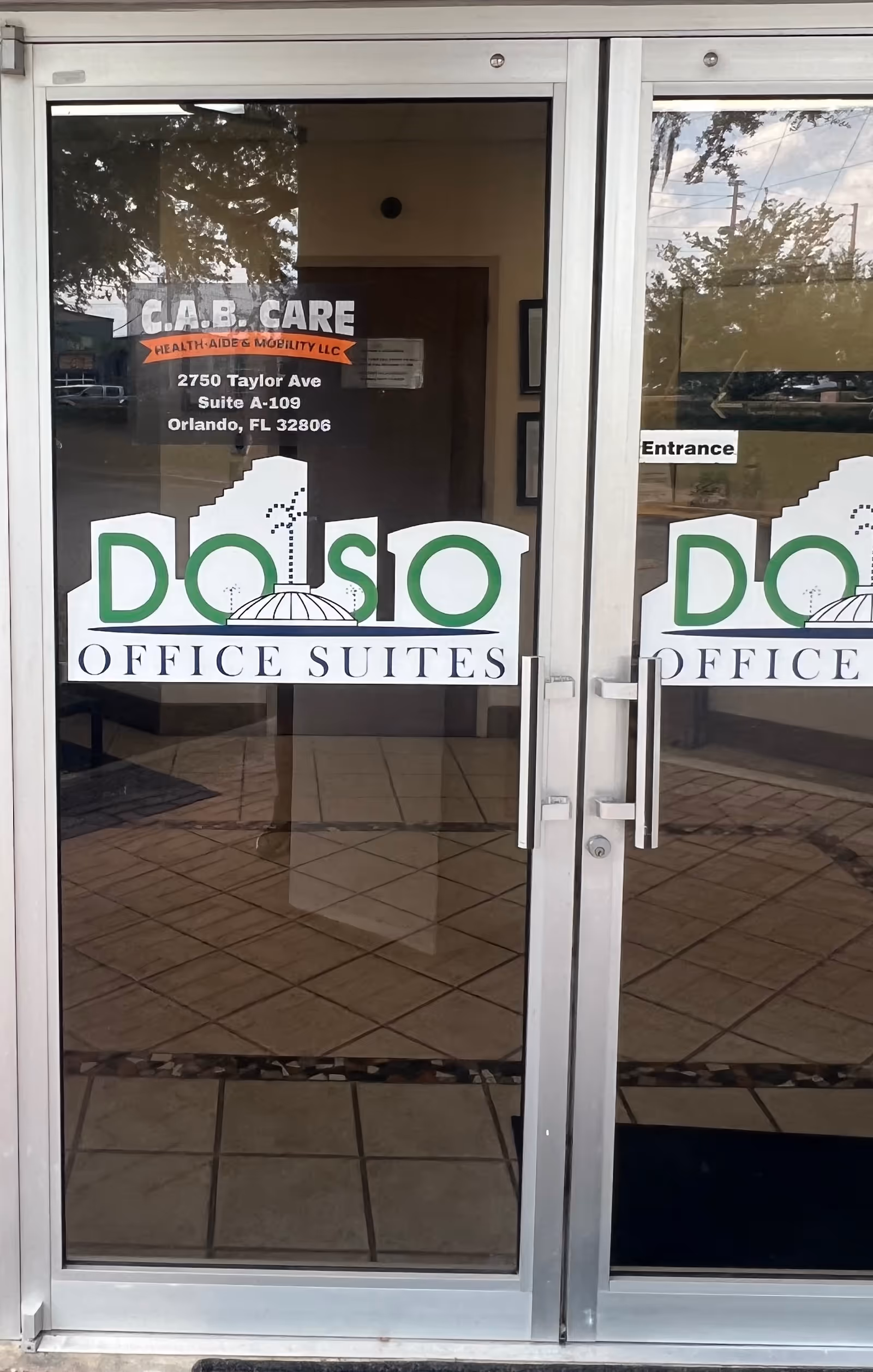 Glass entrance doors display C.A.B. Care Health-Aide & Mobility LLC signage.