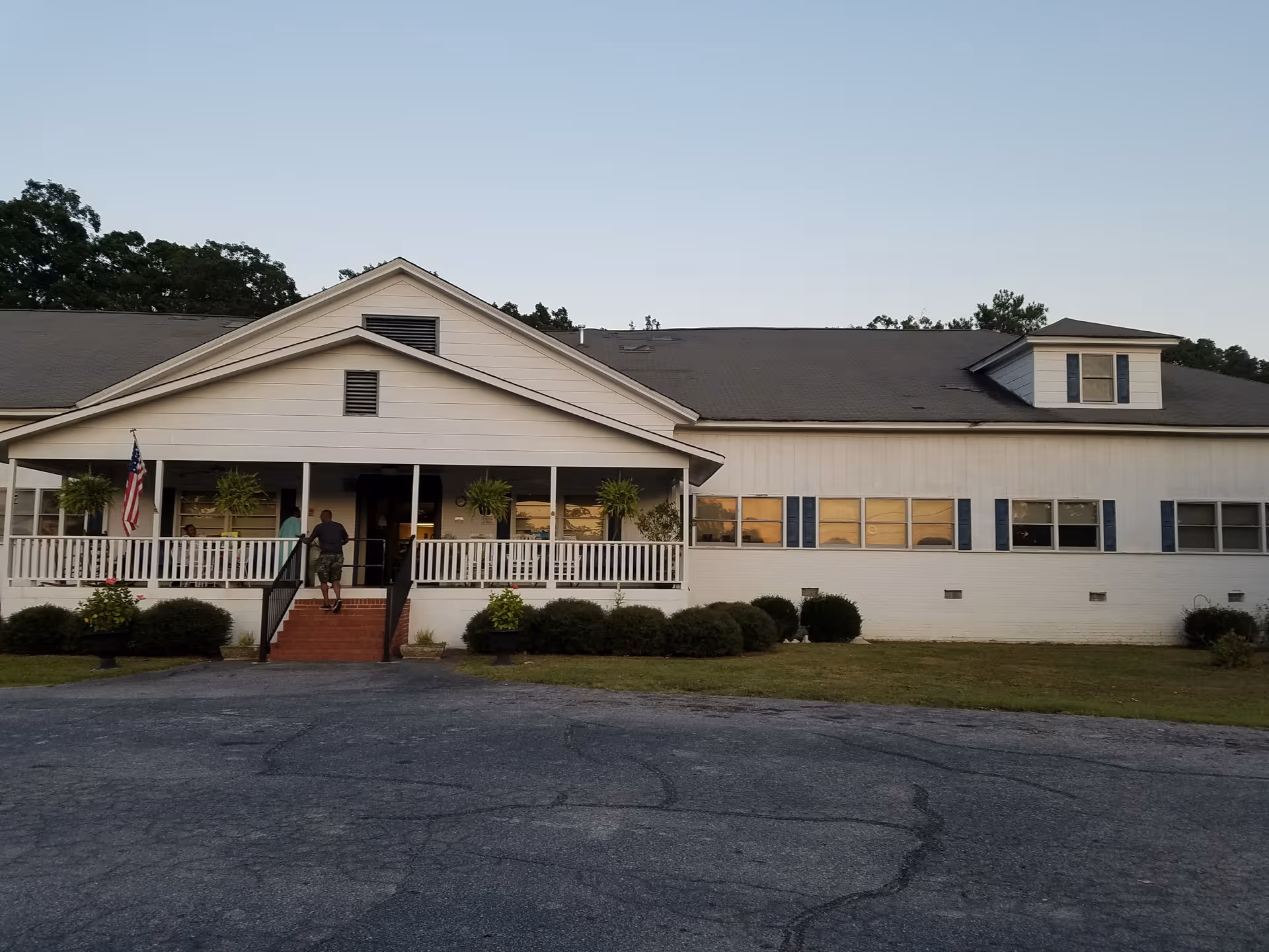 Front view of Nancy Hart Nursing Center for Nursing and Healing, a single-story building with porch.