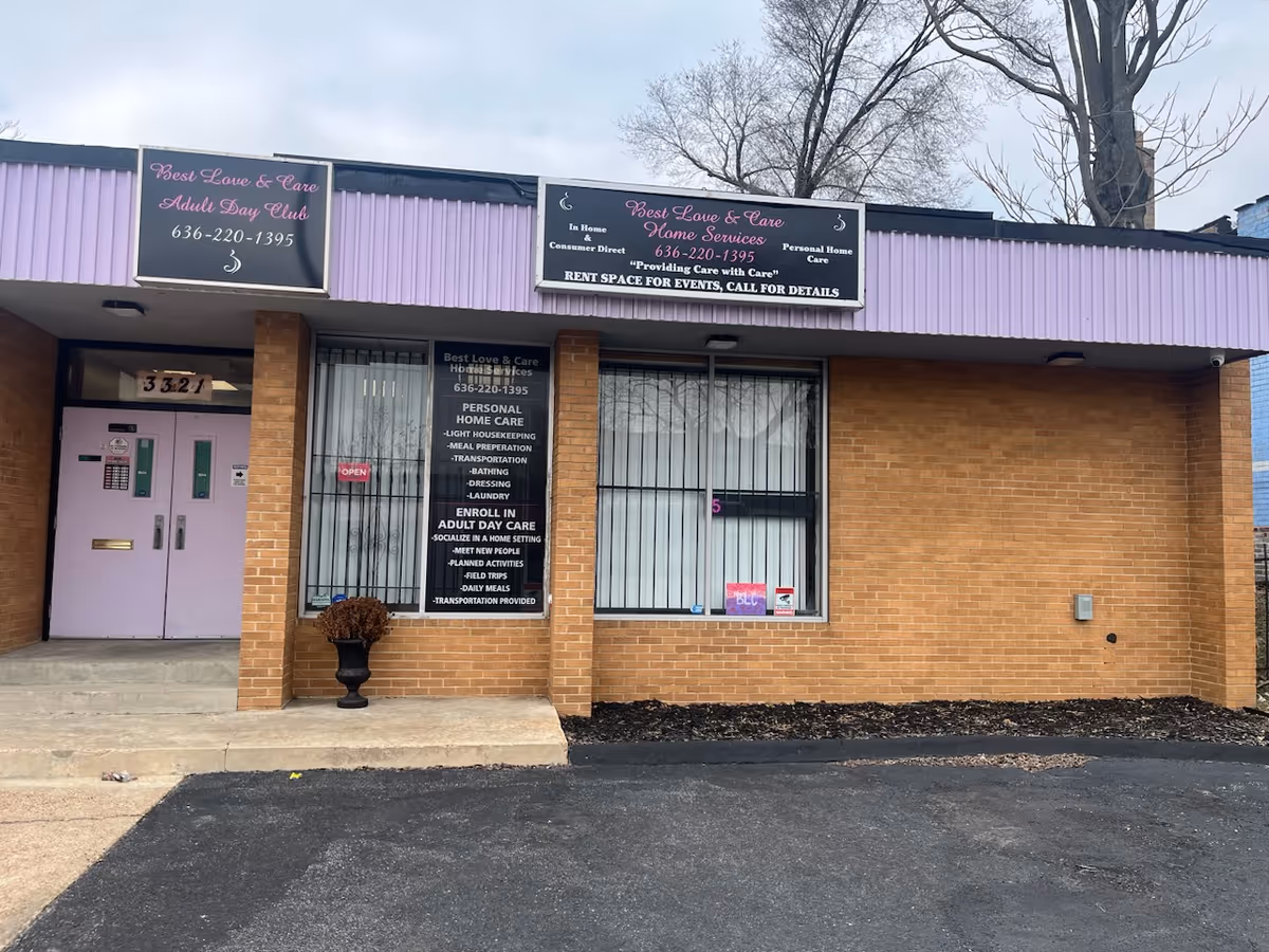 Brick storefront with purple awning and signs for Best Love & Care Home Services
