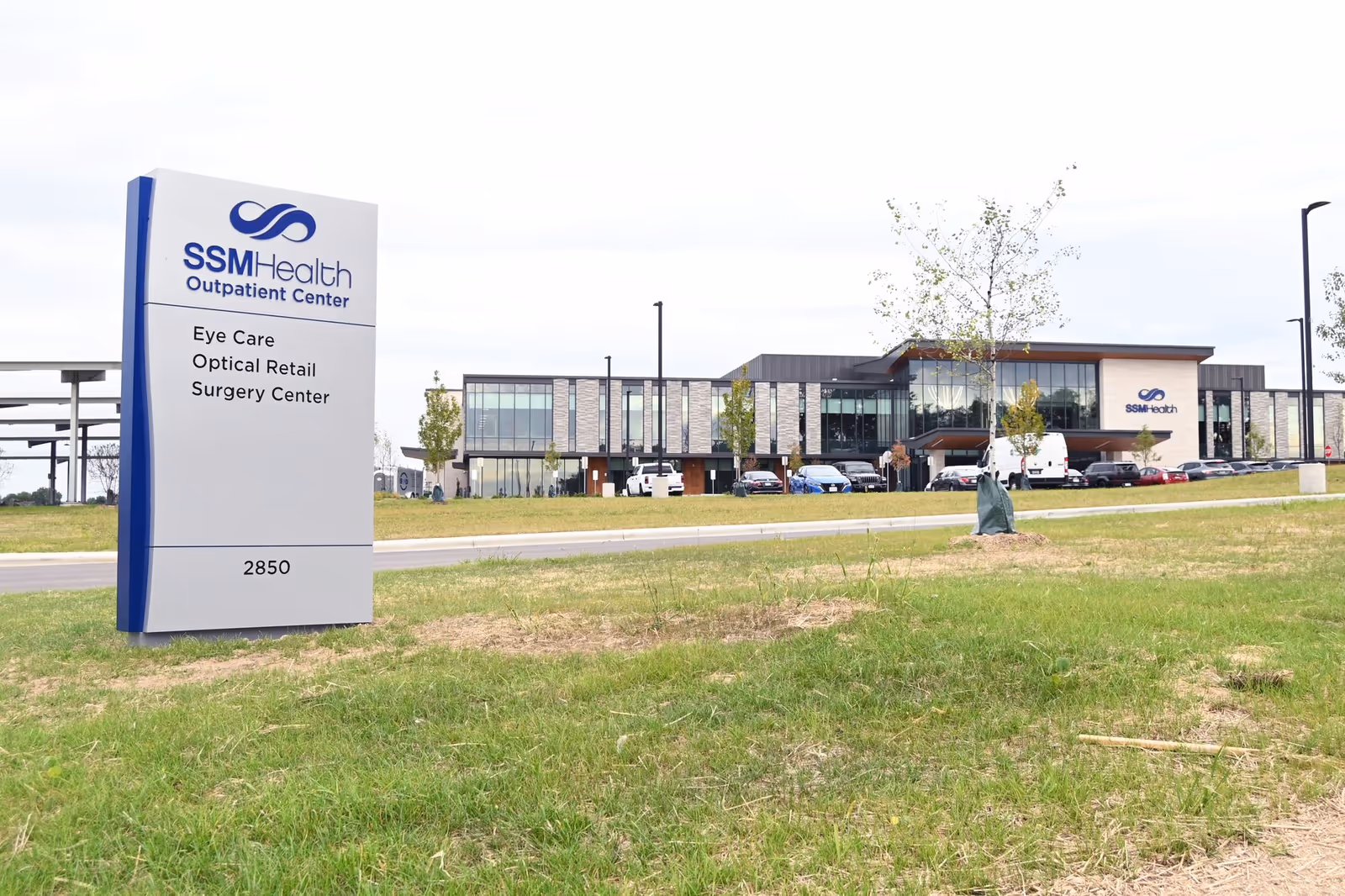 Exterior view of SSM Health Outpatient Center with a large sign in the foreground.