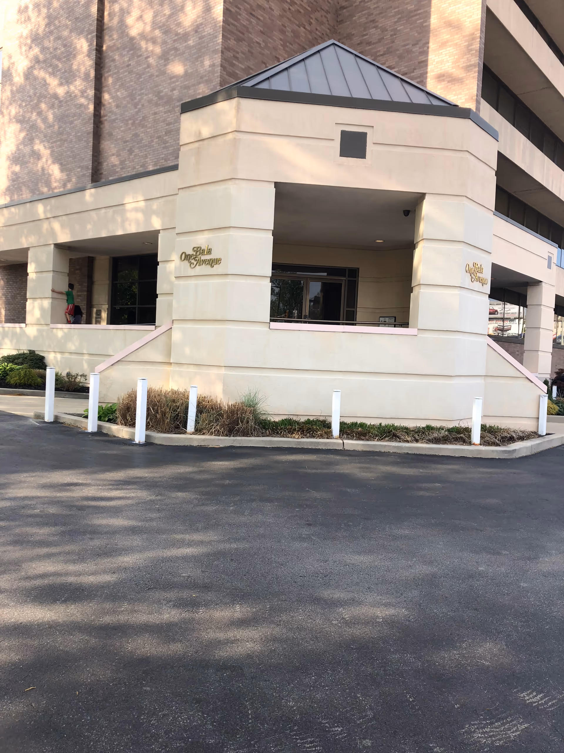 Alpine Home Care facility entrance with a covered entry and driveway