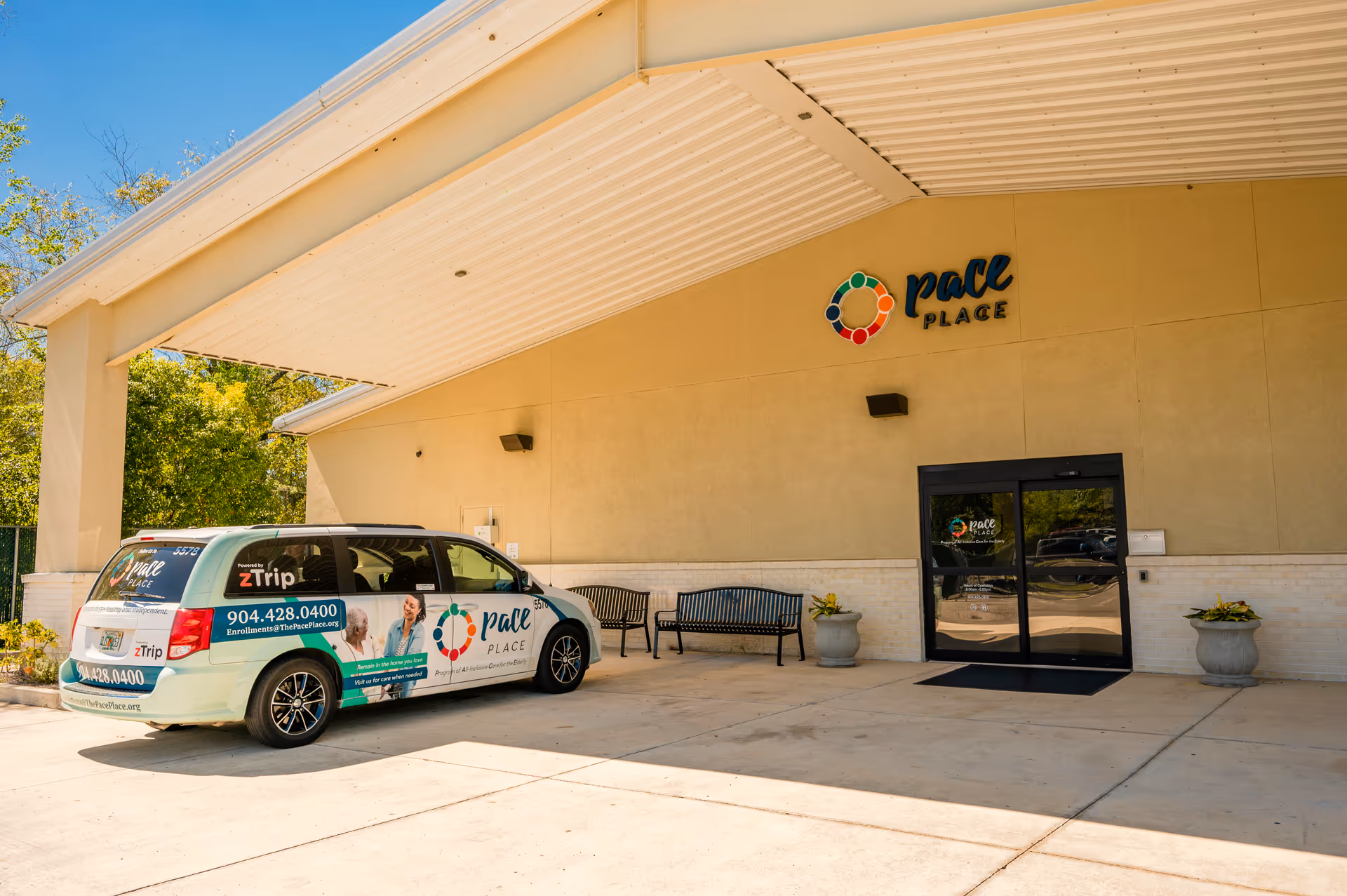 Front exterior of The Pace Place with a branded van parked near the entrance.