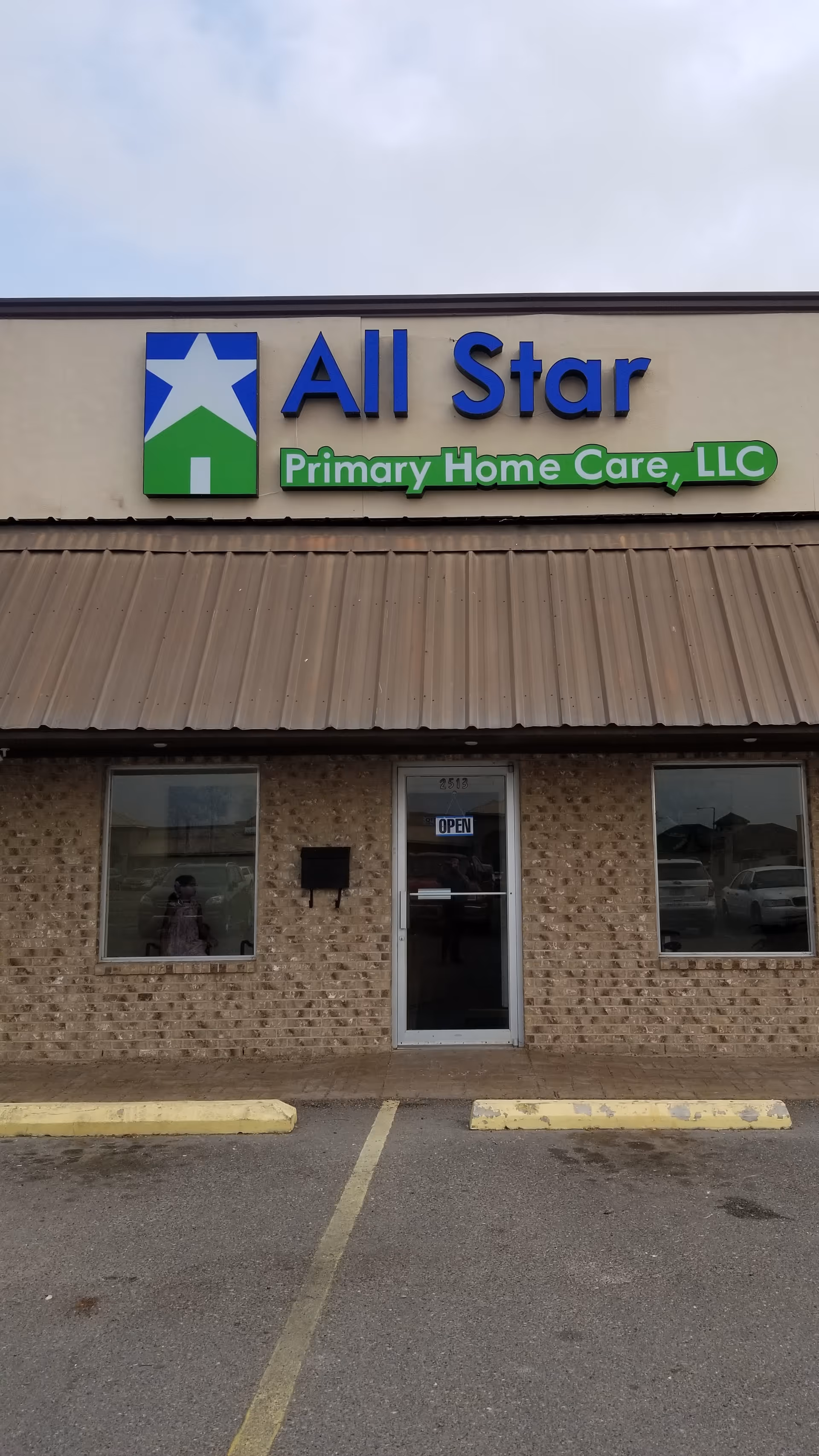 Storefront of All Star Primary Home Care with entrance and parking in front