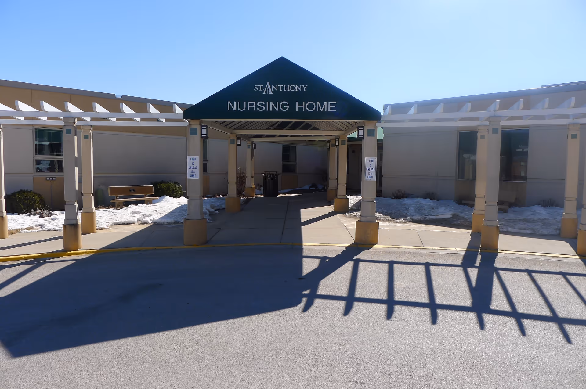 Entrance to St Anthony Nursing Home with a covered drop-off area.