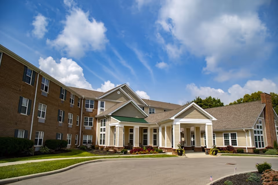 This is an exterior view of The Ashford of Mt. Washington front entrance and driveway.