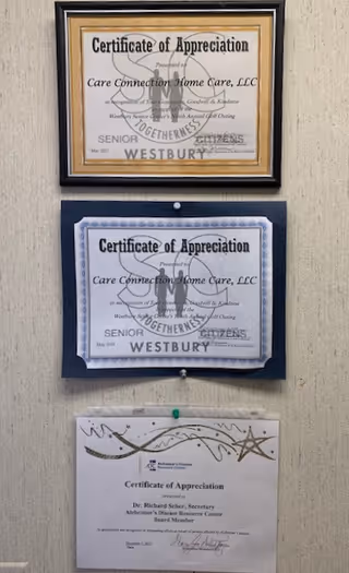 Three framed certificates of appreciation from Care Connection Home Care LLC on a wall.