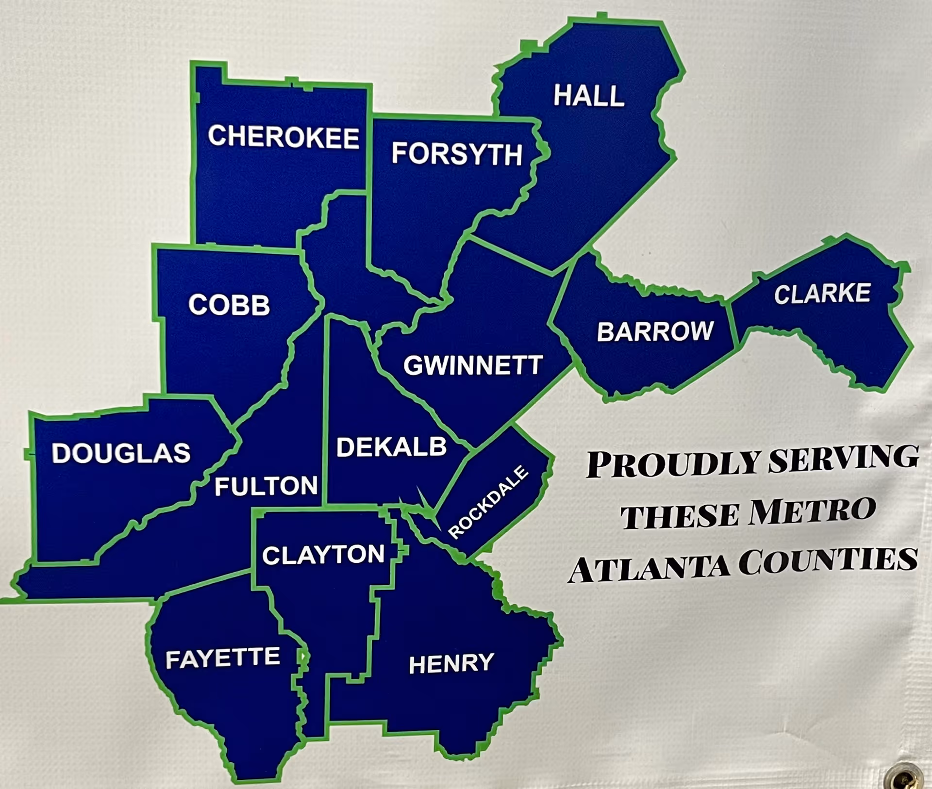 Blue map of Metro Atlanta counties with green outlines and service text