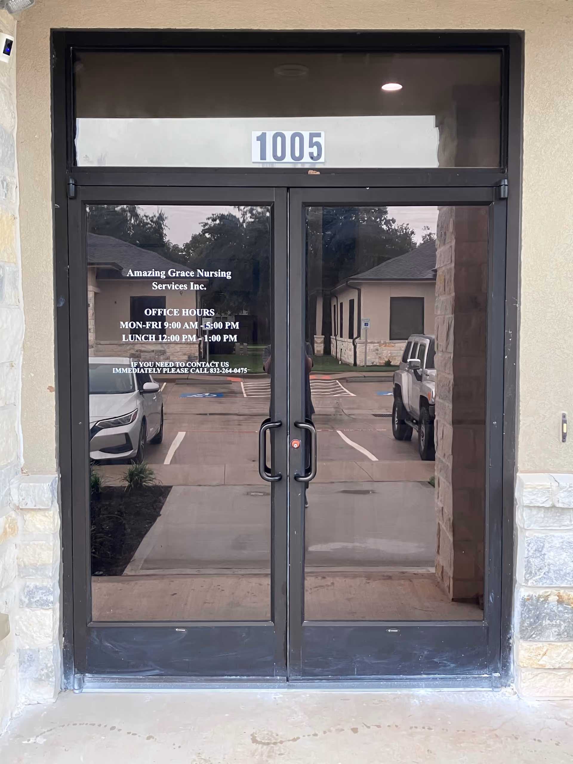 Entrance glass doors of Amazing Grace Nursing Services, address 1005 above.