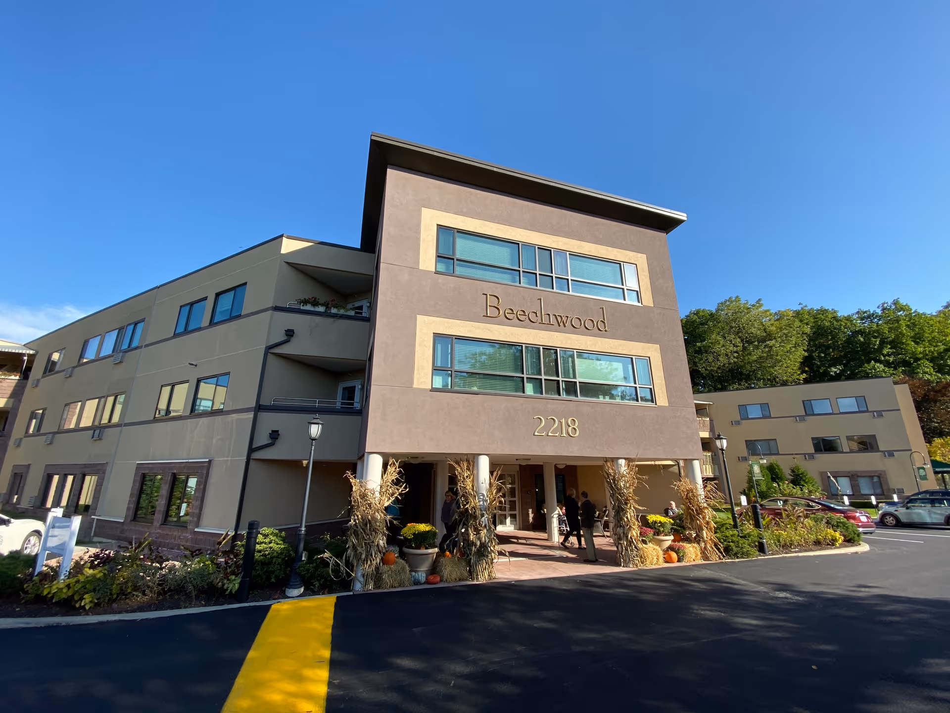 Exterior view of Beechwood at Eddy Memorial facility building with entrance and landscaping.