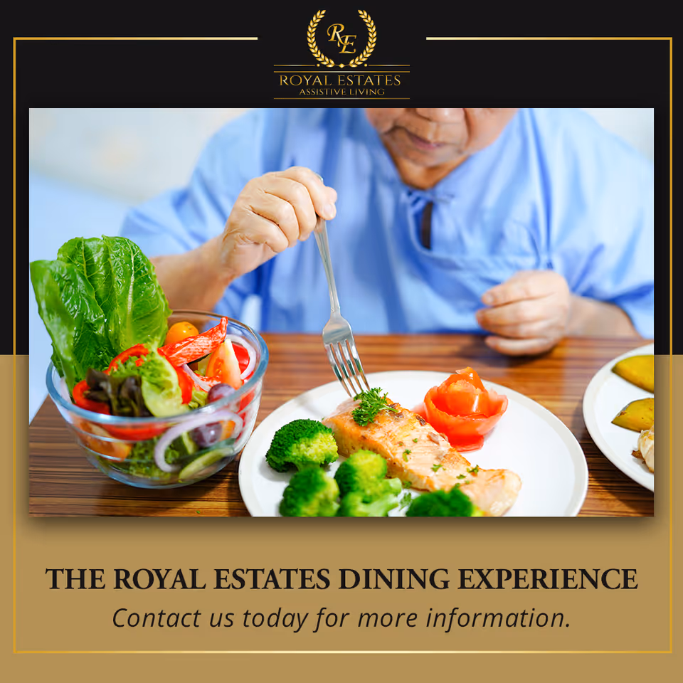 Resident enjoying a plated meal and salad at a dining table.