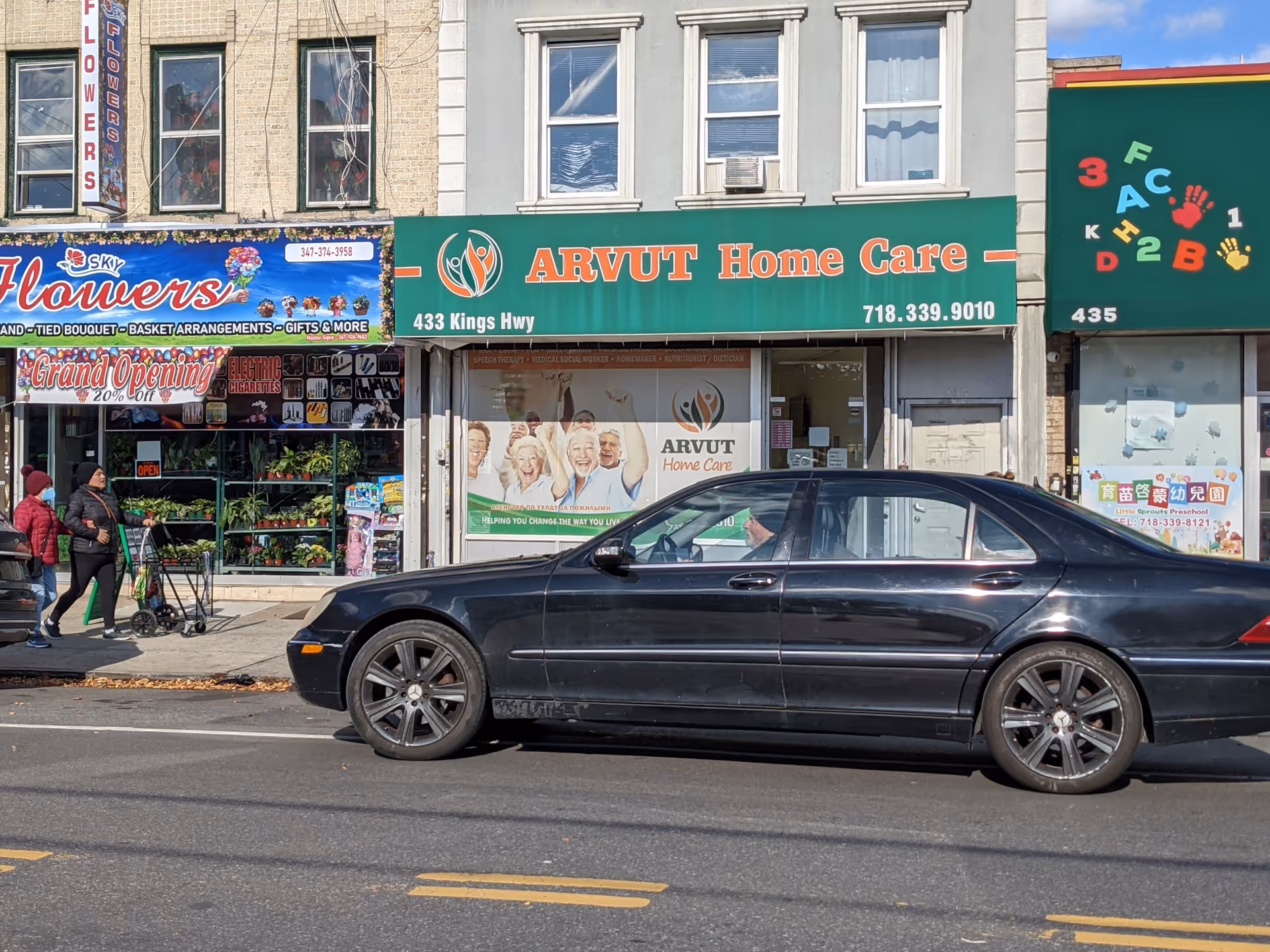 Arvut Home Care storefront on busy street with parked black car