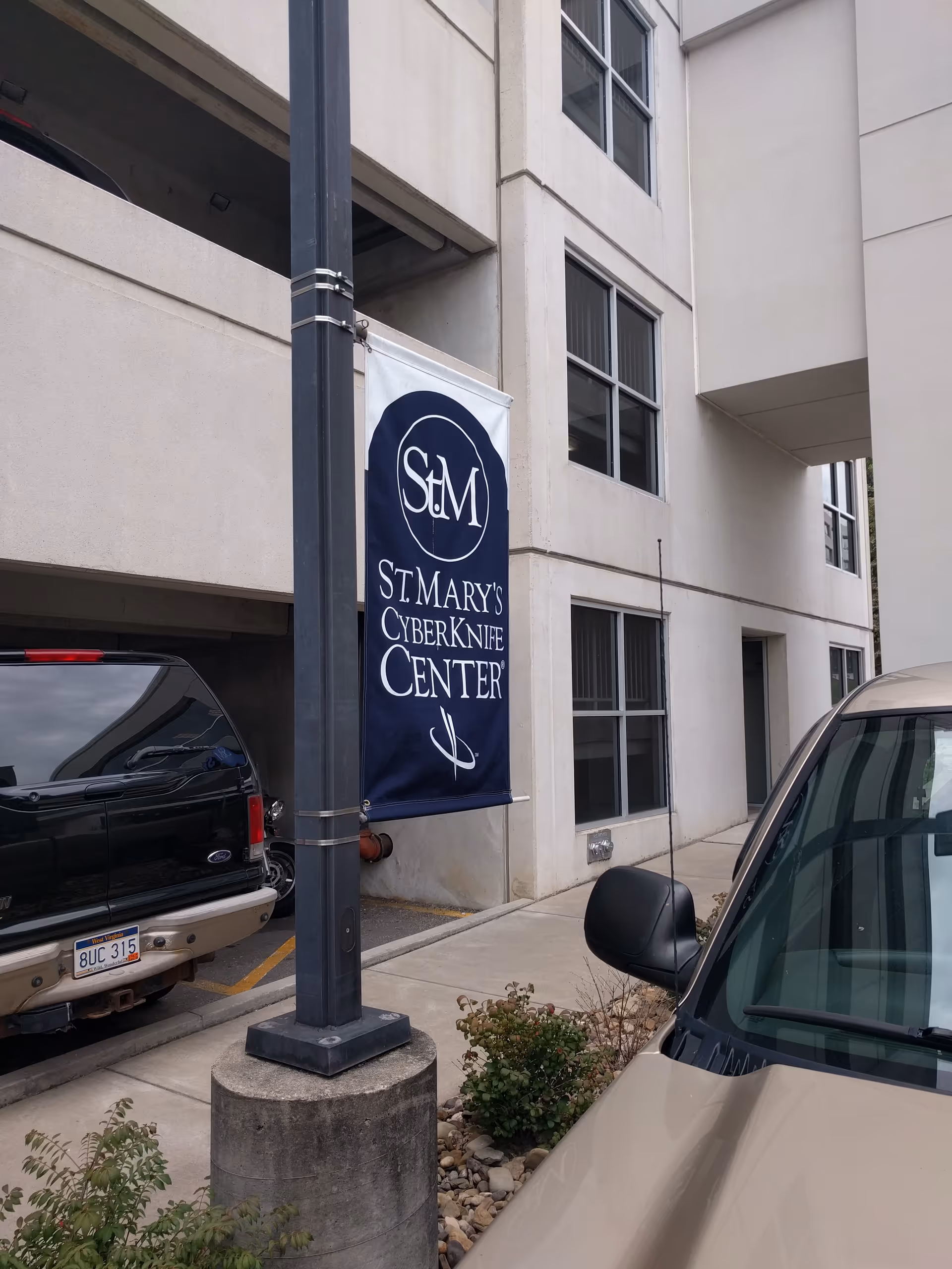 Exterior view of St. Mary's Medical Center with a banner for CyberKnife Center