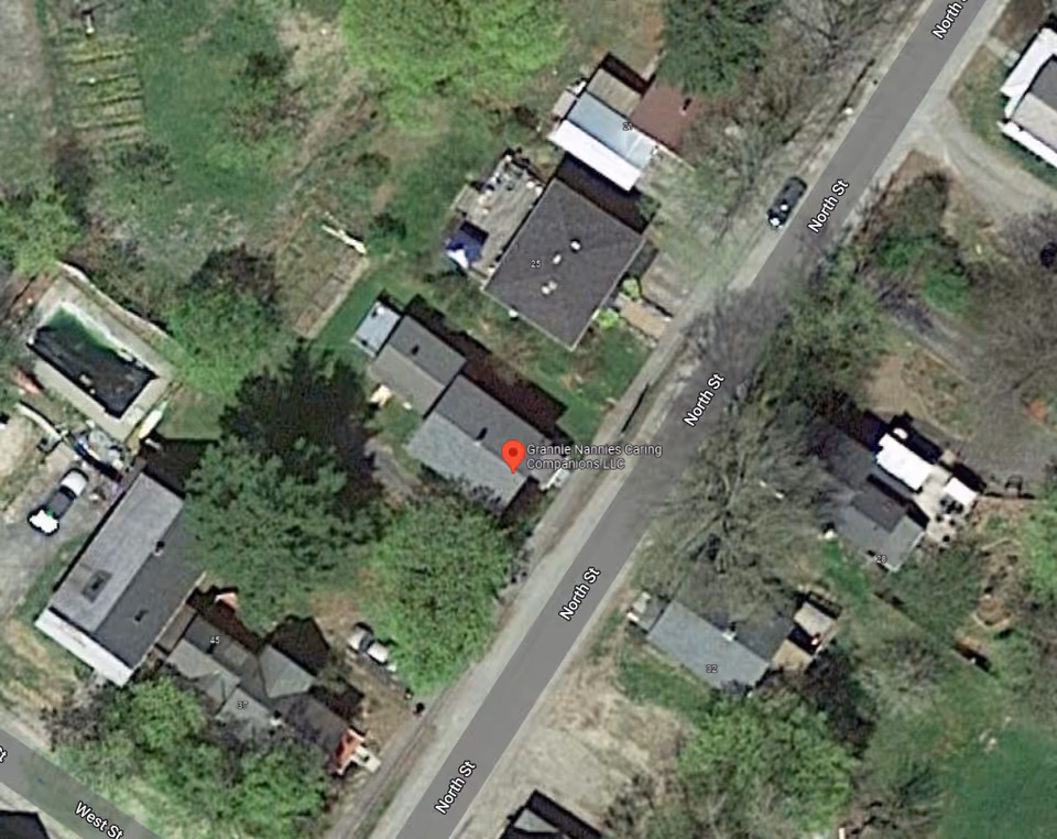 Aerial view of a residential block with Grannie Nannies Caring Companions LLC on North St