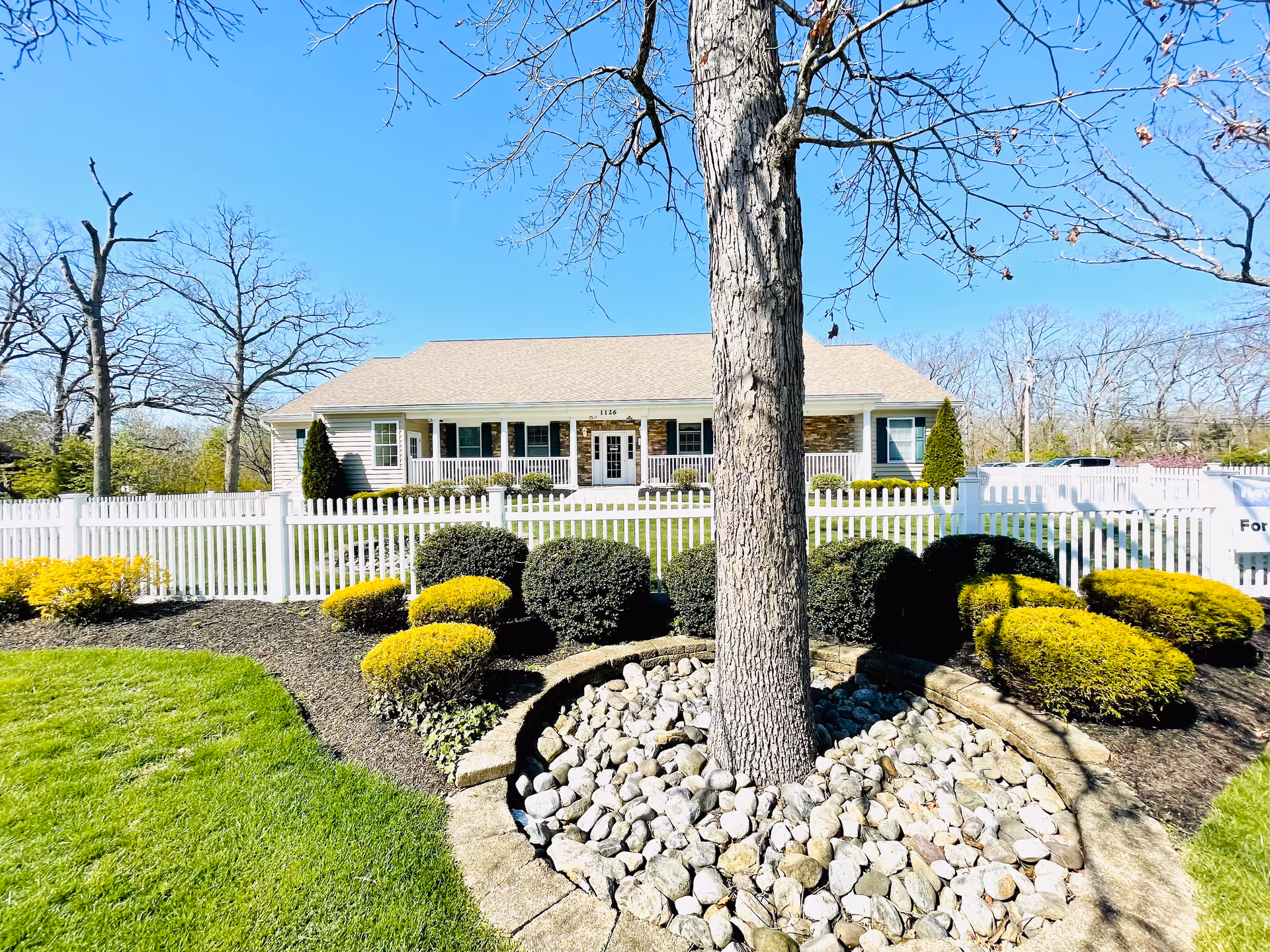 Front view of Alcoeur Gardens at Toms River, a senior living facility.
